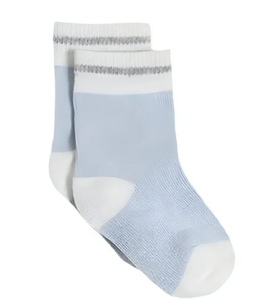 Pair of light blue socks with white accents on a white background